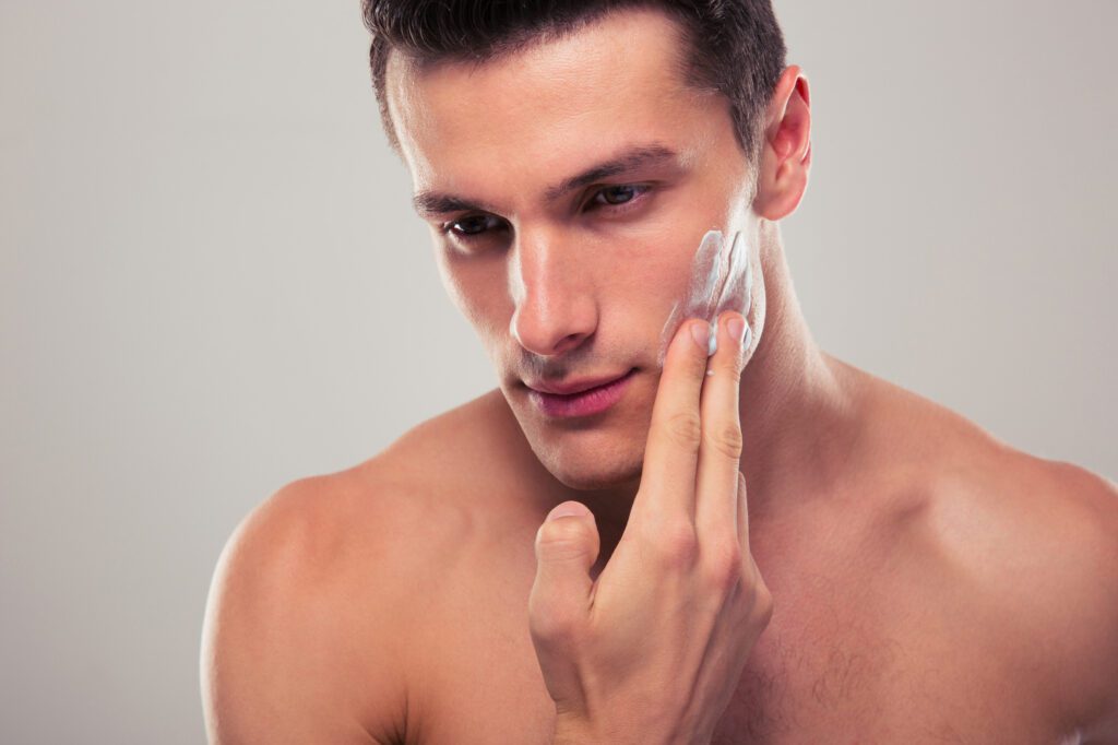 Man applying the best face cream