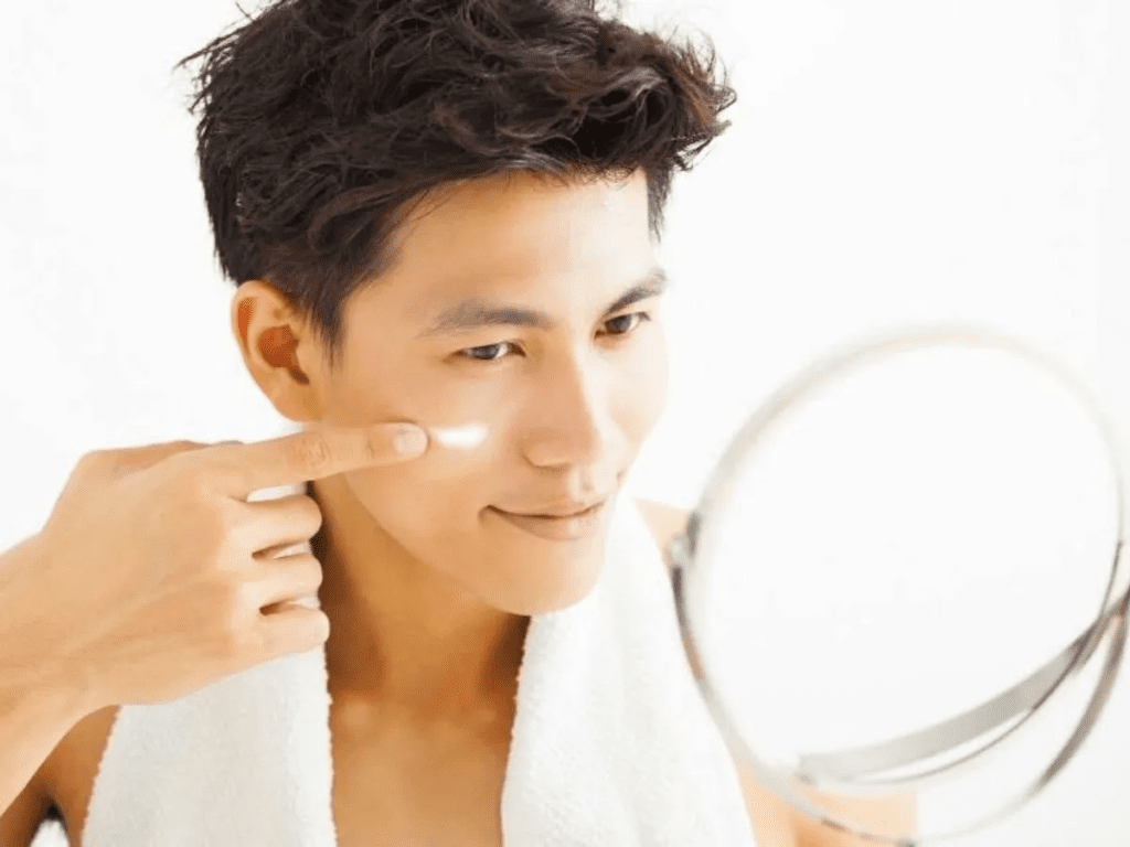 Man using skincare routine with 5 steps